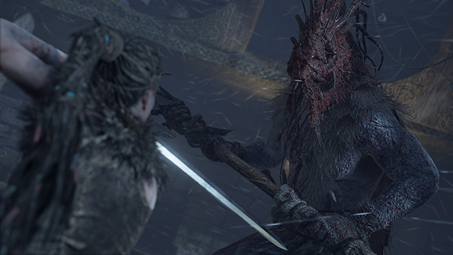 The player-character, Senua, in the game Hellblade (screenshot).